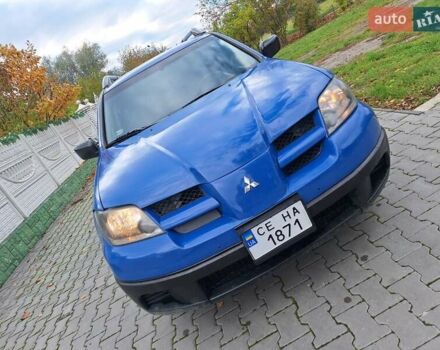 Синій Міцубісі Аутлендер, об'ємом двигуна 2.4 л та пробігом 234 тис. км за 4100 $, фото 14 на Automoto.ua