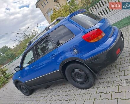 Синій Міцубісі Аутлендер, об'ємом двигуна 2.4 л та пробігом 234 тис. км за 4100 $, фото 2 на Automoto.ua