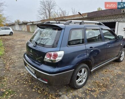 Синій Міцубісі Аутлендер, об'ємом двигуна 2 л та пробігом 211 тис. км за 4600 $, фото 5 на Automoto.ua