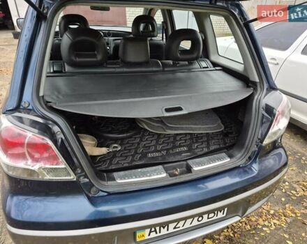 Синій Міцубісі Аутлендер, об'ємом двигуна 2 л та пробігом 211 тис. км за 4600 $, фото 15 на Automoto.ua