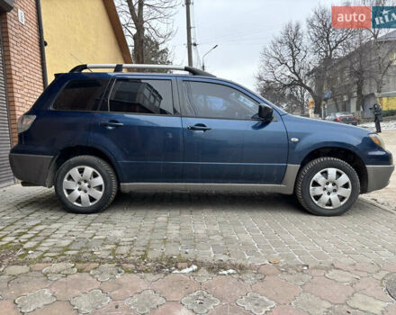 Синій Міцубісі Аутлендер, об'ємом двигуна 2 л та пробігом 340 тис. км за 5000 $, фото 12 на Automoto.ua