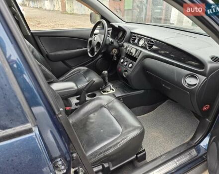 Синій Міцубісі Аутлендер, об'ємом двигуна 2 л та пробігом 211 тис. км за 4600 $, фото 18 на Automoto.ua