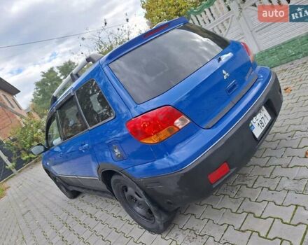 Синій Міцубісі Аутлендер, об'ємом двигуна 2.4 л та пробігом 234 тис. км за 4300 $, фото 3 на Automoto.ua