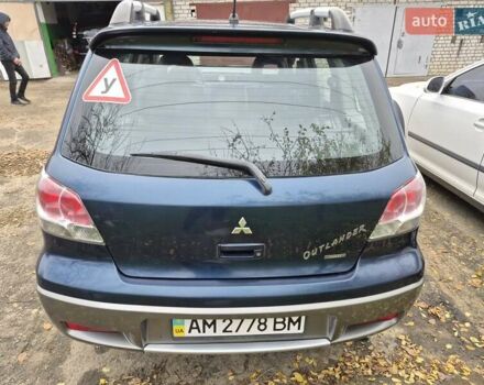 Синій Міцубісі Аутлендер, об'ємом двигуна 2 л та пробігом 211 тис. км за 4600 $, фото 3 на Automoto.ua