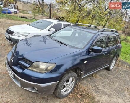 Синій Міцубісі Аутлендер, об'ємом двигуна 2 л та пробігом 211 тис. км за 4600 $, фото 6 на Automoto.ua