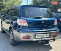 Синий Мицубиси Аутлендер, объемом двигателя 2 л и пробегом 170 тыс. км за 5200 $, фото 4 на Automoto.ua