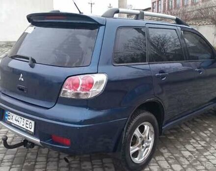 Синий Мицубиси Аутлендер, объемом двигателя 2 л и пробегом 400 тыс. км за 4400 $, фото 11 на Automoto.ua