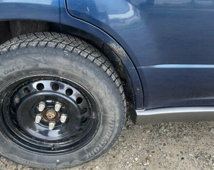 Синий Мицубиси Аутлендер, объемом двигателя 2 л и пробегом 231 тыс. км за 4900 $, фото 3 на Automoto.ua