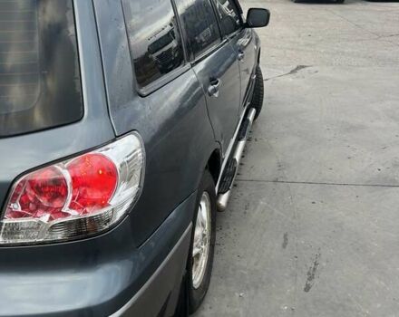 Синий Мицубиси Аутлендер, объемом двигателя 2.38 л и пробегом 300 тыс. км за 4200 $, фото 13 на Automoto.ua