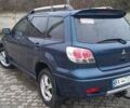 Синий Мицубиси Аутлендер, объемом двигателя 2 л и пробегом 400 тыс. км за 4400 $, фото 9 на Automoto.ua
