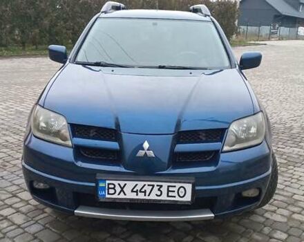 Синий Мицубиси Аутлендер, объемом двигателя 2 л и пробегом 400 тыс. км за 4400 $, фото 3 на Automoto.ua