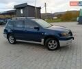 Синий Мицубиси Аутлендер, объемом двигателя 2.38 л и пробегом 250 тыс. км за 6350 $, фото 4 на Automoto.ua