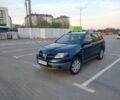 Синий Мицубиси Аутлендер, объемом двигателя 2 л и пробегом 180 тыс. км за 5800 $, фото 1 на Automoto.ua