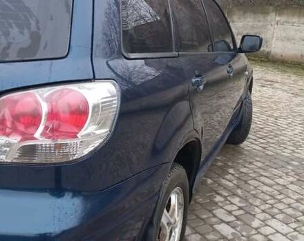 Синий Мицубиси Аутлендер, объемом двигателя 2 л и пробегом 400 тыс. км за 4400 $, фото 6 на Automoto.ua