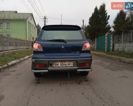 Синий Мицубиси Аутлендер, объемом двигателя 2.38 л и пробегом 175 тыс. км за 6500 $, фото 5 на Automoto.ua