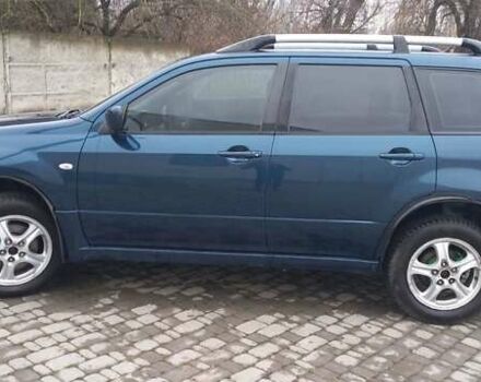 Синий Мицубиси Аутлендер, объемом двигателя 2 л и пробегом 400 тыс. км за 4400 $, фото 8 на Automoto.ua