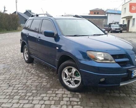 Синий Мицубиси Аутлендер, объемом двигателя 2 л и пробегом 400 тыс. км за 4400 $, фото 13 на Automoto.ua