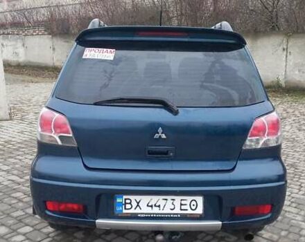 Синий Мицубиси Аутлендер, объемом двигателя 2 л и пробегом 400 тыс. км за 4400 $, фото 10 на Automoto.ua