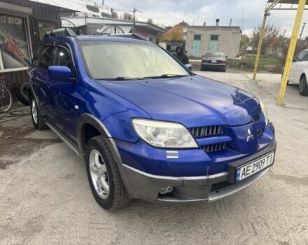 Синій Міцубісі Аутлендер, об'ємом двигуна 2.4 л та пробігом 220 тис. км за 4500 $, фото 1 на Automoto.ua