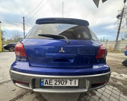 Синій Міцубісі Аутлендер, об'ємом двигуна 2.4 л та пробігом 220 тис. км за 4500 $, фото 2 на Automoto.ua
