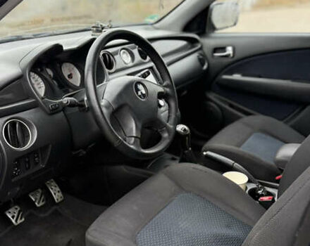 Синий Мицубиси Аутлендер, объемом двигателя 2.4 л и пробегом 243 тыс. км за 5000 $, фото 20 на Automoto.ua