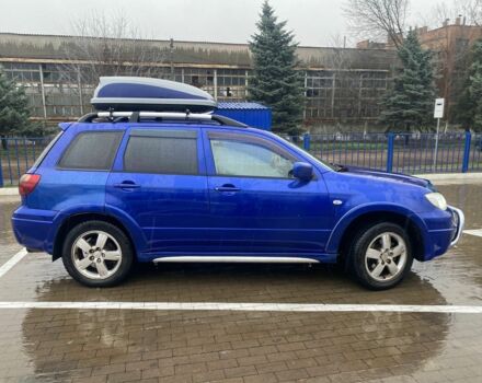 Синий Мицубиси Аутлендер, объемом двигателя 2 л и пробегом 234 тыс. км за 5500 $, фото 2 на Automoto.ua