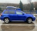 Синий Мицубиси Аутлендер, объемом двигателя 2 л и пробегом 234 тыс. км за 5500 $, фото 2 на Automoto.ua