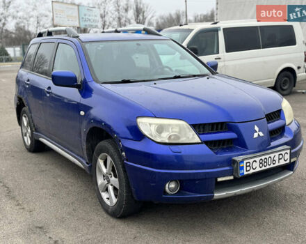 Синий Мицубиси Аутлендер, объемом двигателя 2.4 л и пробегом 245 тыс. км за 4600 $, фото 7 на Automoto.ua