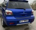Синий Мицубиси Аутлендер, объемом двигателя 2.4 л и пробегом 243 тыс. км за 5000 $, фото 15 на Automoto.ua