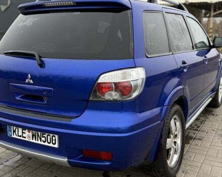 Синий Мицубиси Аутлендер, объемом двигателя 2.4 л и пробегом 243 тыс. км за 5000 $, фото 16 на Automoto.ua