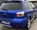 Синий Мицубиси Аутлендер, объемом двигателя 2.4 л и пробегом 243 тыс. км за 5000 $, фото 16 на Automoto.ua