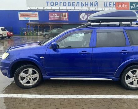 Синій Міцубісі Аутлендер, об'ємом двигуна 2 л та пробігом 234 тис. км за 5500 $, фото 1 на Automoto.ua