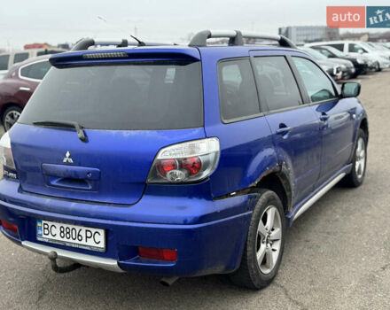 Синий Мицубиси Аутлендер, объемом двигателя 2.4 л и пробегом 245 тыс. км за 4600 $, фото 5 на Automoto.ua