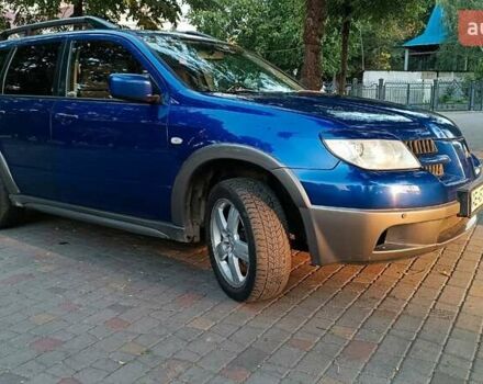 Синій Міцубісі Аутлендер, об'ємом двигуна 2 л та пробігом 287 тис. км за 6000 $, фото 4 на Automoto.ua