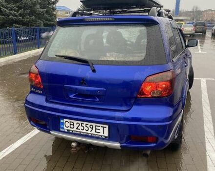 Синій Міцубісі Аутлендер, об'ємом двигуна 2 л та пробігом 234 тис. км за 5500 $, фото 4 на Automoto.ua