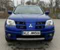 Синий Мицубиси Аутлендер, объемом двигателя 2.4 л и пробегом 243 тыс. км за 5000 $, фото 4 на Automoto.ua