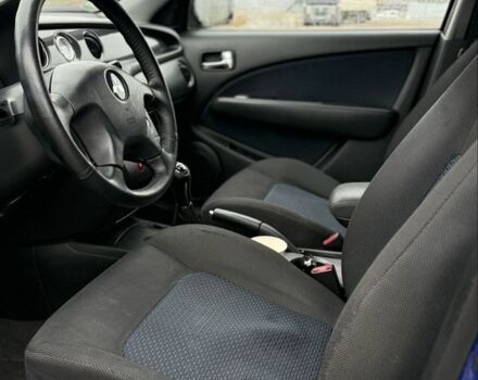 Синий Мицубиси Аутлендер, объемом двигателя 2.4 л и пробегом 243 тыс. км за 5000 $, фото 11 на Automoto.ua