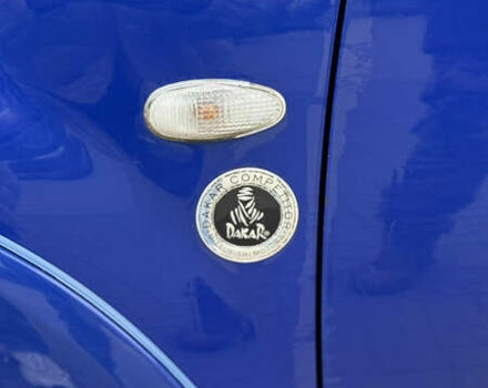 Синий Мицубиси Аутлендер, объемом двигателя 2.4 л и пробегом 243 тыс. км за 5000 $, фото 7 на Automoto.ua