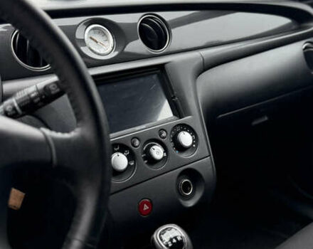 Синий Мицубиси Аутлендер, объемом двигателя 2.4 л и пробегом 243 тыс. км за 5000 $, фото 5 на Automoto.ua