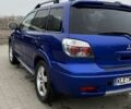 Синий Мицубиси Аутлендер, объемом двигателя 2.4 л и пробегом 243 тыс. км за 5000 $, фото 13 на Automoto.ua