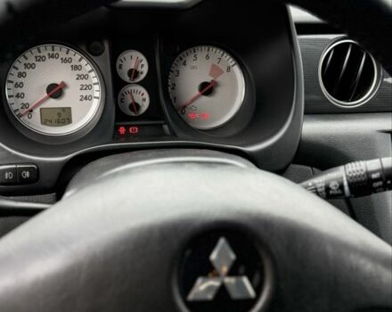 Синий Мицубиси Аутлендер, объемом двигателя 2.4 л и пробегом 243 тыс. км за 5000 $, фото 10 на Automoto.ua