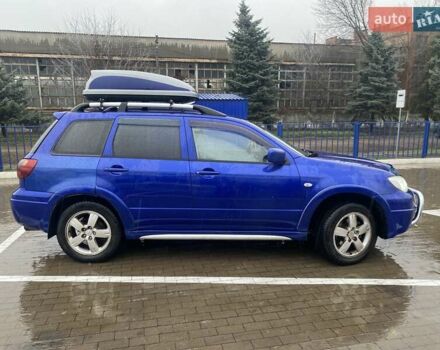Синій Міцубісі Аутлендер, об'ємом двигуна 2 л та пробігом 234 тис. км за 5500 $, фото 3 на Automoto.ua