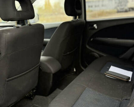 Синий Мицубиси Аутлендер, объемом двигателя 2.4 л и пробегом 243 тыс. км за 5000 $, фото 21 на Automoto.ua