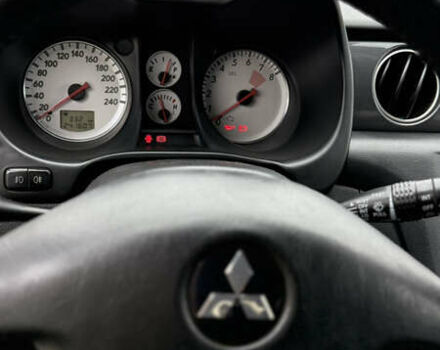 Синий Мицубиси Аутлендер, объемом двигателя 2.4 л и пробегом 243 тыс. км за 5000 $, фото 22 на Automoto.ua