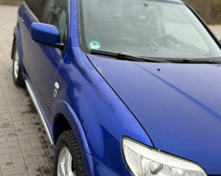 Синий Мицубиси Аутлендер, объемом двигателя 2.4 л и пробегом 243 тыс. км за 5000 $, фото 17 на Automoto.ua