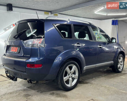 Синий Мицубиси Аутлендер, объемом двигателя 2 л и пробегом 228 тыс. км за 7999 $, фото 6 на Automoto.ua