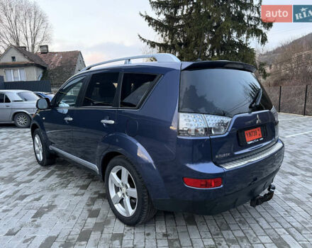 Синий Мицубиси Аутлендер, объемом двигателя 2 л и пробегом 228 тыс. км за 8888 $, фото 6 на Automoto.ua