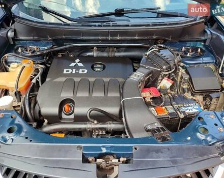 Синий Мицубиси Аутлендер, объемом двигателя 1.97 л и пробегом 196 тыс. км за 8950 $, фото 26 на Automoto.ua