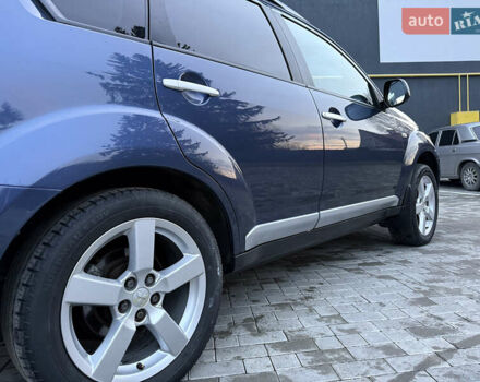 Синий Мицубиси Аутлендер, объемом двигателя 2 л и пробегом 228 тыс. км за 8888 $, фото 16 на Automoto.ua