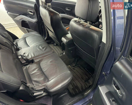 Синий Мицубиси Аутлендер, объемом двигателя 2 л и пробегом 228 тыс. км за 7999 $, фото 34 на Automoto.ua